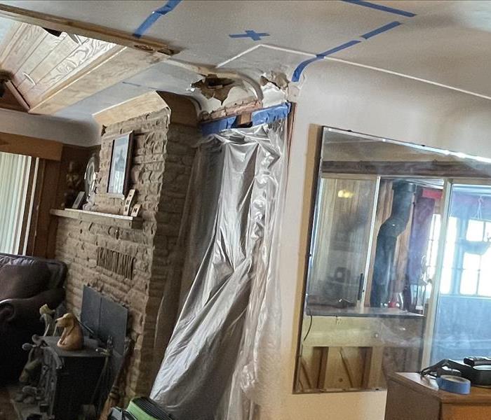 This picture shows the affect a roof leak had on the inside of a customers home.
