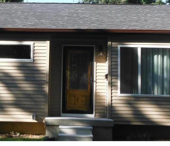The second image shows the same home after SERVPRO of Port Huron restored the home.